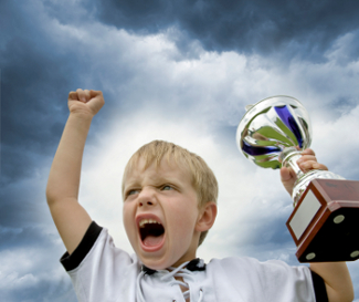 Boy Holding Trophy